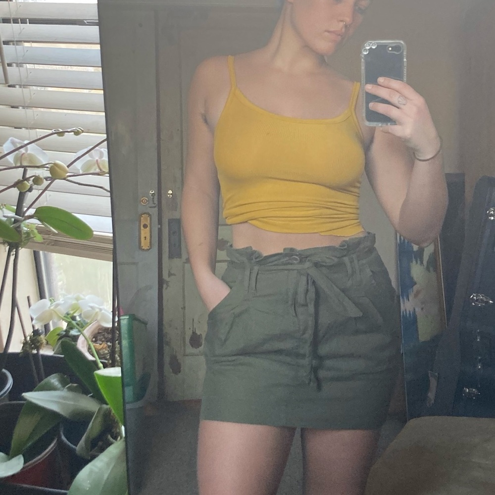 Army green mini skirt.